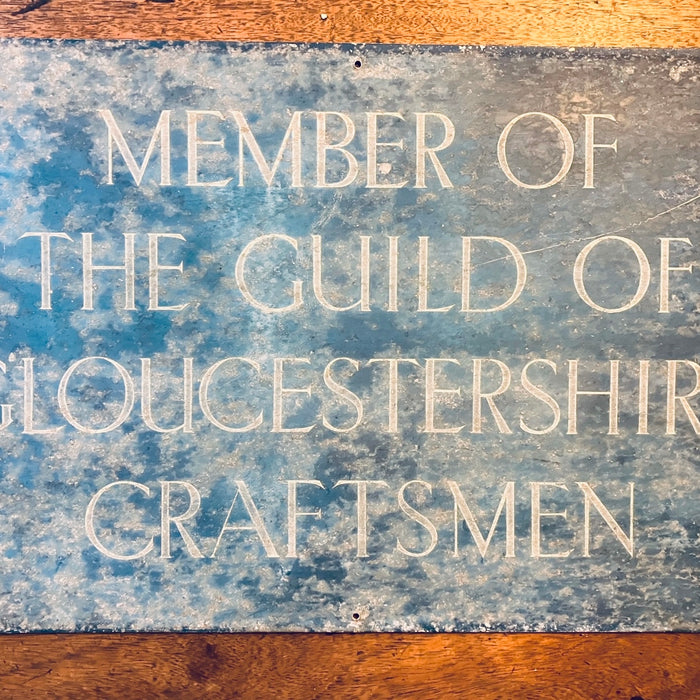 metal sign reading member of the Guild of Gloucestershire Craftsmen