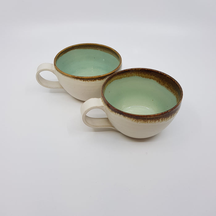 Curve Cup, satin cream/ turquoise glaze tenmoku rim (TL302)