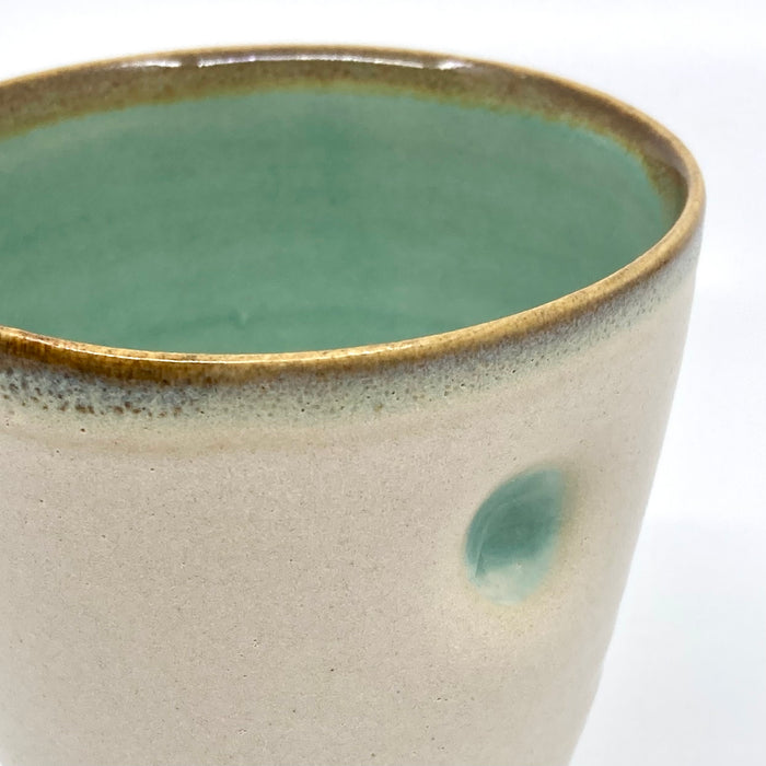 Thumb beaker, satin cream/turquoise glaze tenmoku rim (TL304)
