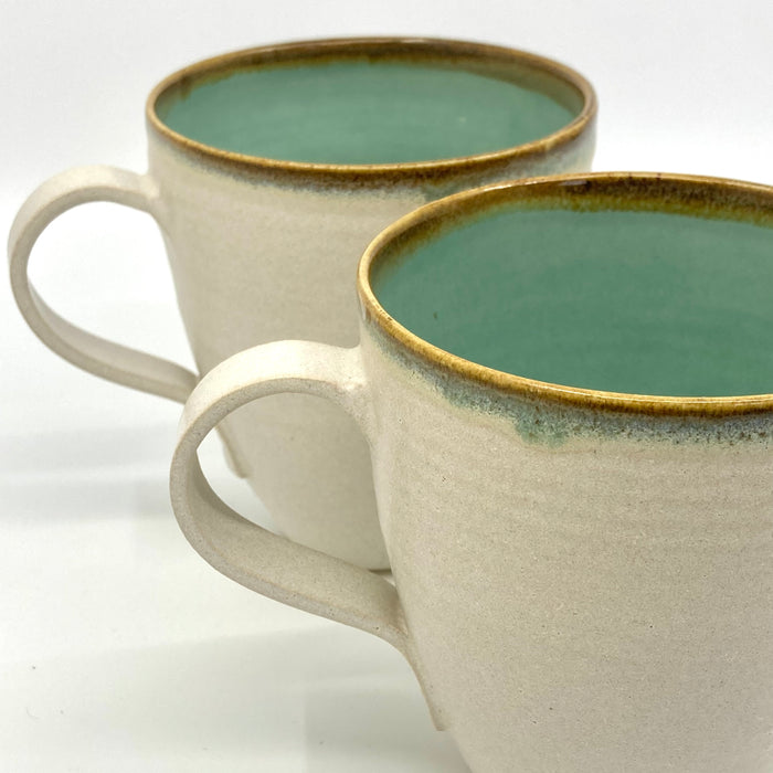 Curve Mug, satin cream/turquoise glaze tenmoku rim (TL294)