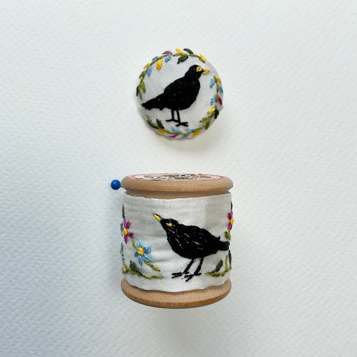Blackbird & Forget-me-not embroidered cotton reel with button and pin cushion( LW352)