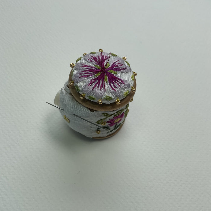 Floral cotton reel with pincushion on the back and button (LW355)