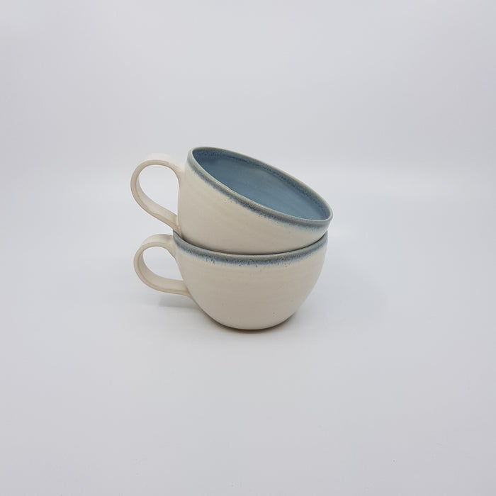 Curve Cup, satin cream/pale blue glaze, grey rim (TL454)