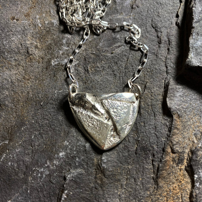 Triangular pendant, traces in the sand series, silver (UAP388)