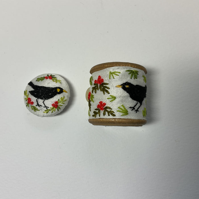 Blackbird & Rowan embroidered cotton reel with button ( LW265)